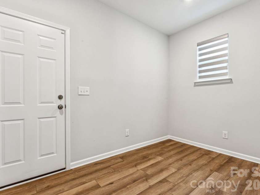 8704 Frank Grier Road, Charlotte, NC 28215.  MLS# CAR4433413, YatesRealty ID 56267. Drop zone to garage