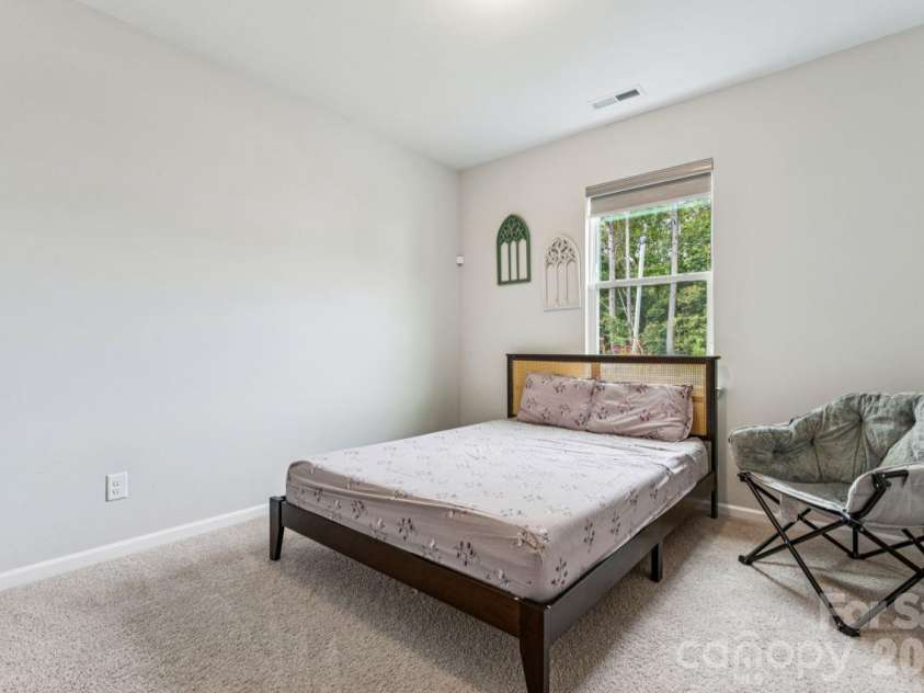 8704 Frank Grier Road, Charlotte, NC 28215.  MLS# CAR4433413, YatesRealty ID 56267. Main level bedroom