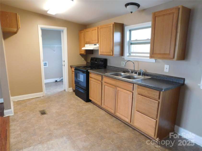 1909 Lawyers Road, Monroe, NC 28110.  MLS# CAR4234355, YatesRealty ID 5627. Kitchen view