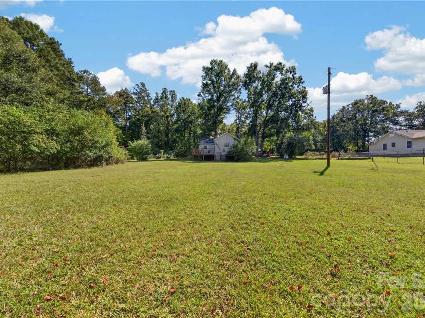 7572 Charlotte Highway, Indian Land, SC 29707.  MLS# CAR4430507, YatesRealty ID 56272. Backyard
