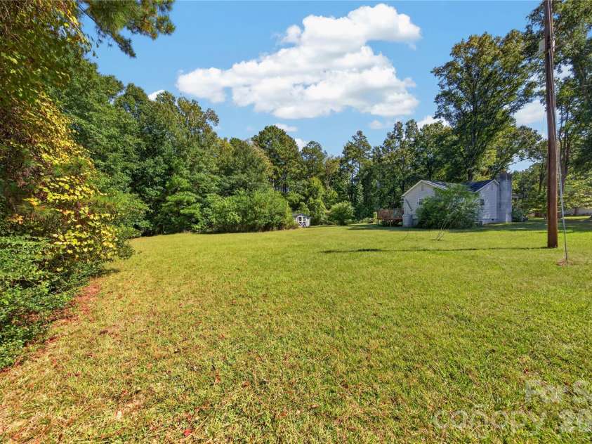 7572 Charlotte Highway, Indian Land, SC 29707.  MLS# CAR4430507, YatesRealty ID 56272. Huge Flat Backyard