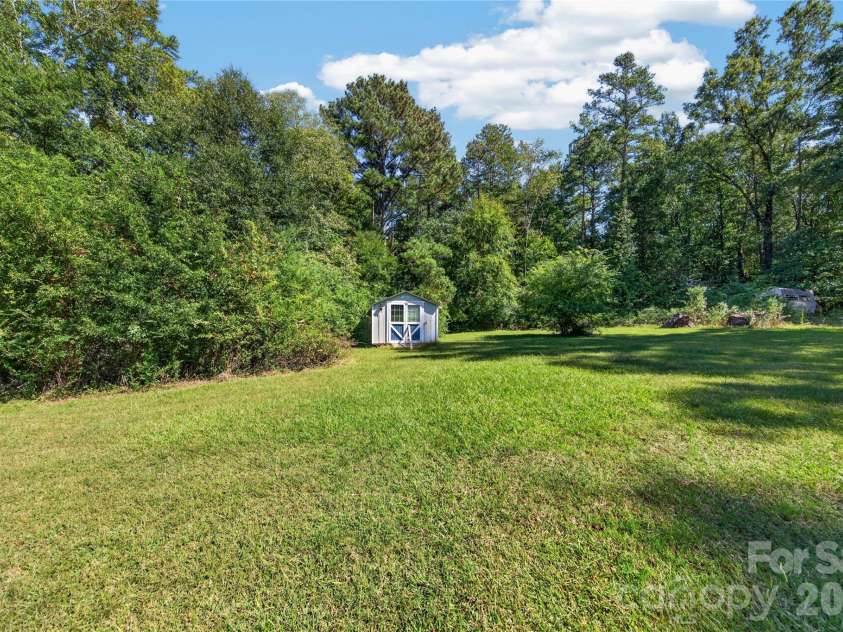 7572 Charlotte Highway, Indian Land, SC 29707.  MLS# CAR4430507, YatesRealty ID 56272. Storage Shed
