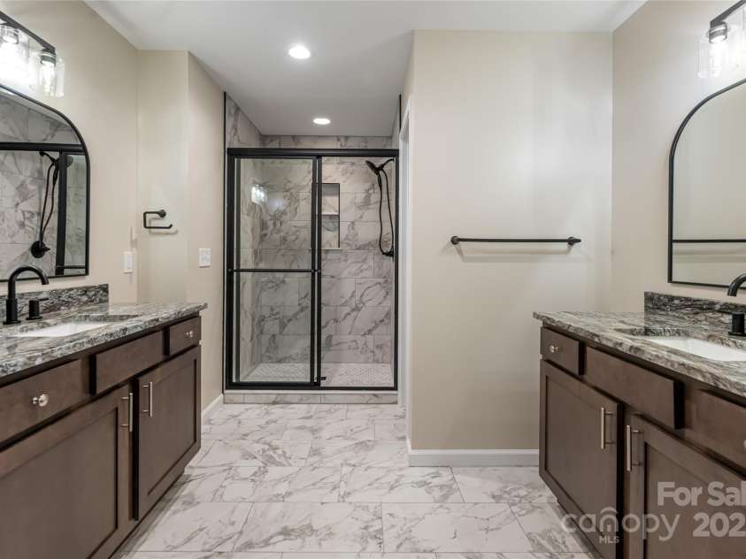 181 Flint Morgan Road, Mars Hill, NC 28754.  MLS# CAR4288459, YatesRealty ID 5628. Open and spacious primary bath
