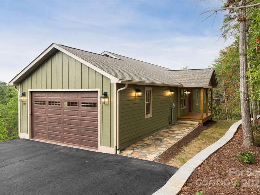 181 Flint Morgan Road, Mars Hill, NC 28754.  MLS# CAR4288459, YatesRealty ID 5628. Oversized Garage