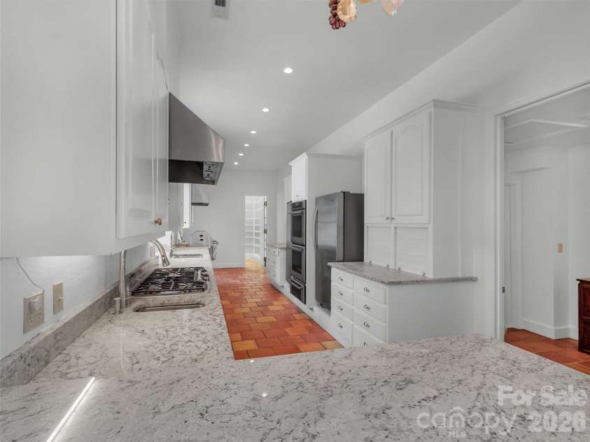 2222 Greenspire Drive, Sylva, NC 28779.  MLS# CAR4159278, YatesRealty ID 5629. Chef's kitchen.
