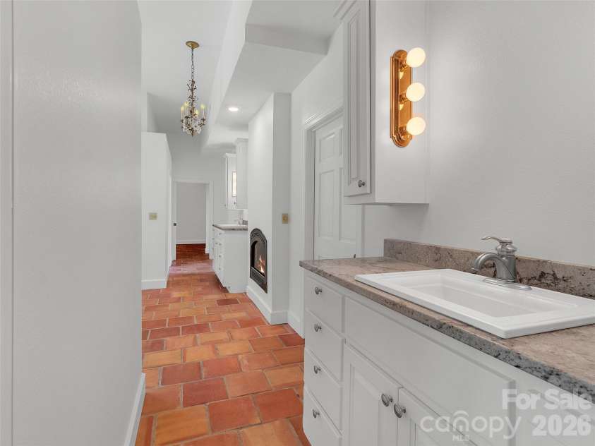 2222 Greenspire Drive, Sylva, NC 28779.  MLS# CAR4159278, YatesRealty ID 5629. Double vanities in Primary suite.