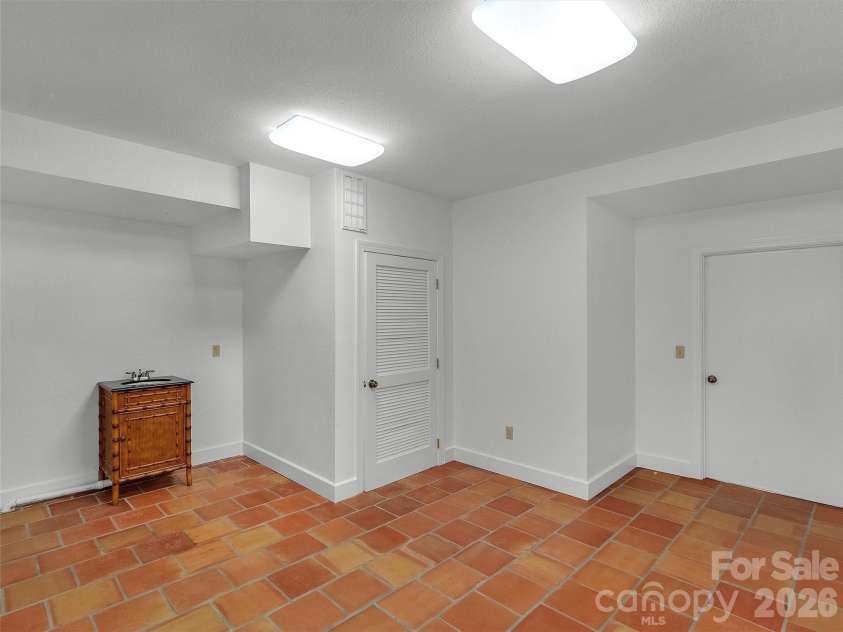 2222 Greenspire Drive, Sylva, NC 28779.  MLS# CAR4159278, YatesRealty ID 5629. Flex/gym space.