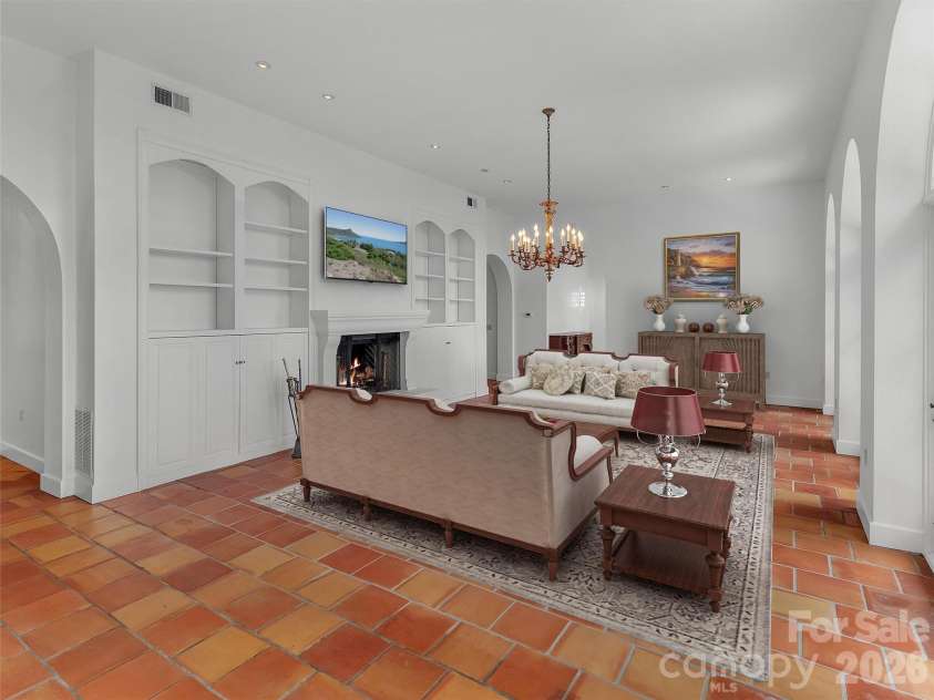 2222 Greenspire Drive, Sylva, NC 28779.  MLS# CAR4159278, YatesRealty ID 5629. FP in main level living space.