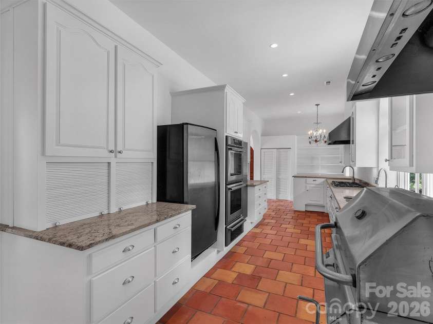 2222 Greenspire Drive, Sylva, NC 28779.  MLS# CAR4159278, YatesRealty ID 5629. Fully equipped with even a grilling station!