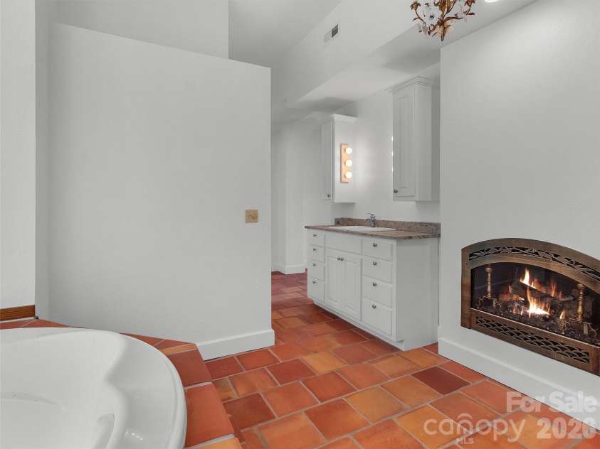 2222 Greenspire Drive, Sylva, NC 28779.  MLS# CAR4159278, YatesRealty ID 5629. Primary bathroom FP.