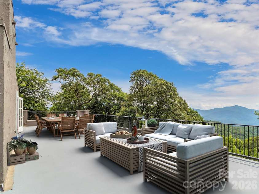 2222 Greenspire Drive, Sylva, NC 28779.  MLS# CAR4159278, YatesRealty ID 5629. Upper patio ready for entertaining.