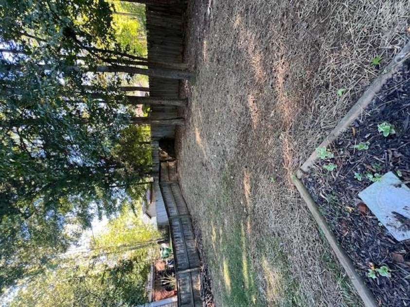 21411 Aftonshire Drive, Cornelius, NC 28031.  MLS# CAR4433846, YatesRealty ID 56299. Backyard