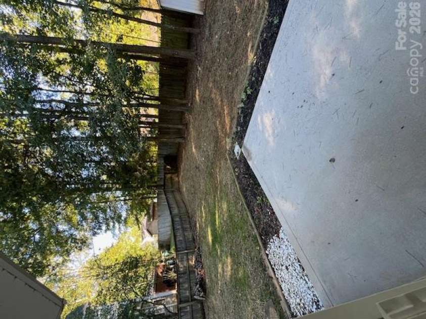 21411 Aftonshire Drive, Cornelius, NC 28031.  MLS# CAR4433846, YatesRealty ID 56299. Patio and Backyard