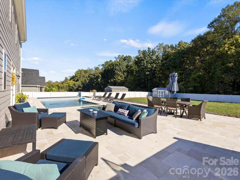 1305 Coppergate Drive, Salisbury, NC 28147.  MLS# CAR4428820, YatesRealty ID 56314. Entertaining areas packed into every corner of this back yard!