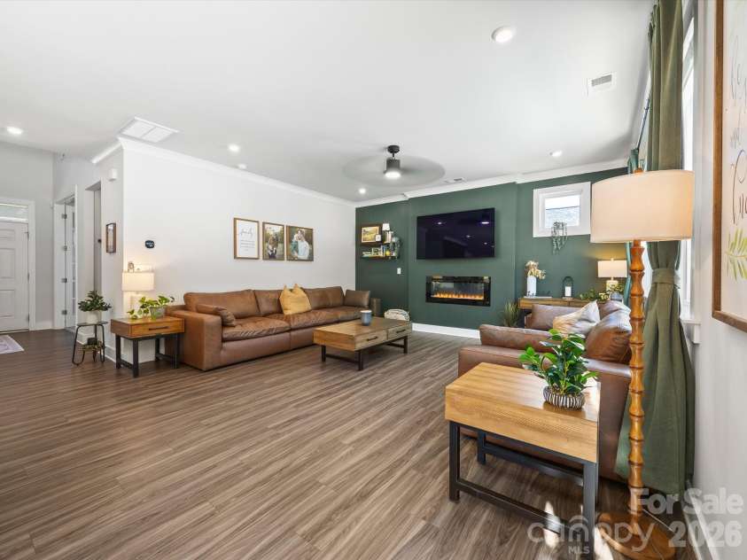 1305 Coppergate Drive, Salisbury, NC 28147.  MLS# CAR4428820, YatesRealty ID 56314. Living area with electric fireplace