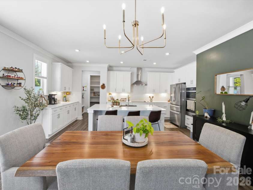 1305 Coppergate Drive, Salisbury, NC 28147.  MLS# CAR4428820, YatesRealty ID 56314. Room for plenty of seating at dining table and bar
