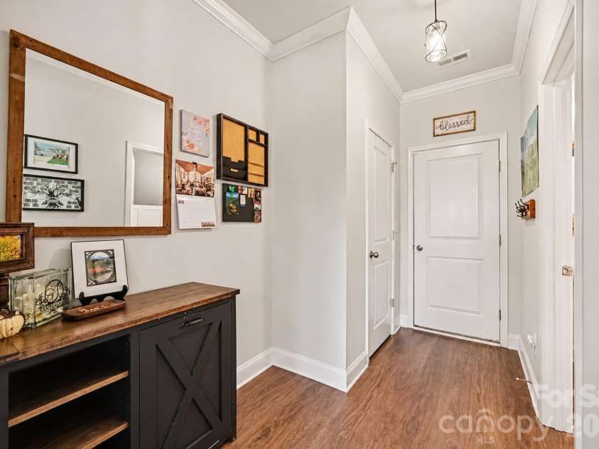 2703 Wedgewood Court, Denver, NC 28037.  MLS# CAR4428262, YatesRealty ID 56317. A wide hallway with space for a drop zone or console table.