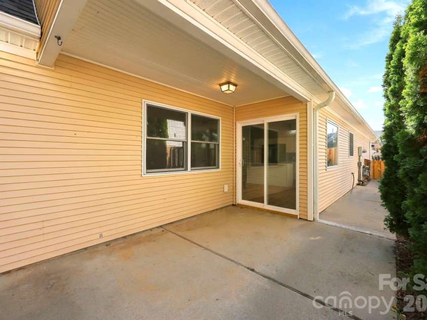 29 Beekeeper Trail, Swannanoa, NC 28778.  MLS# CAR4430763, YatesRealty ID 56319. Covered Side Patio