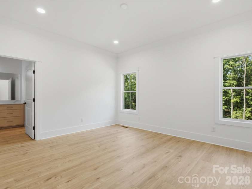 8018 Fairmont Drive, Waxhaw, NC 28173.  MLS# CAR4276331, YatesRealty ID 5633. Lower level guest suite