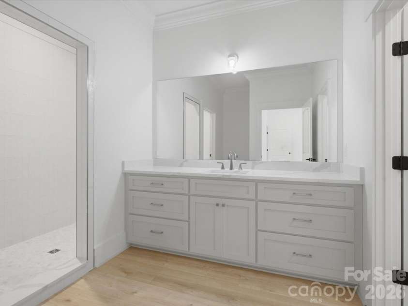 8018 Fairmont Drive, Waxhaw, NC 28173.  MLS# CAR4276331, YatesRealty ID 5633. Lower level guest suite