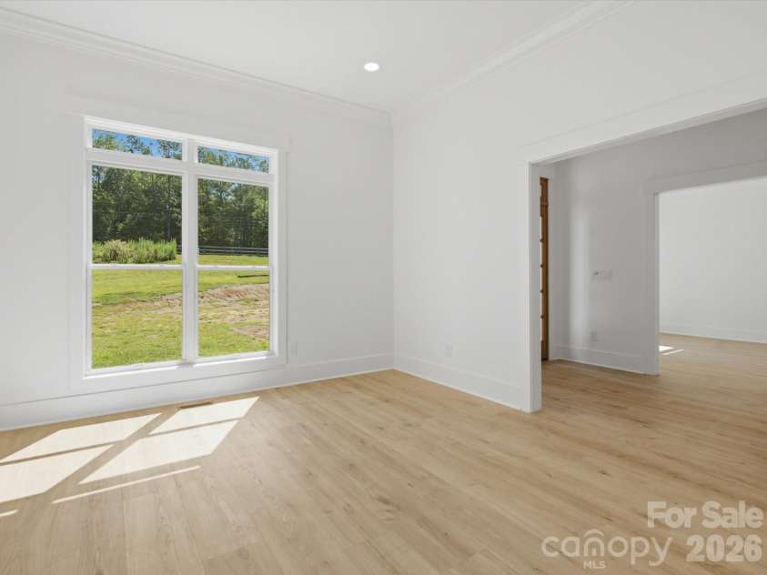 8018 Fairmont Drive, Waxhaw, NC 28173.  MLS# CAR4276331, YatesRealty ID 5633. Lower level office/flex/ dining / foyer