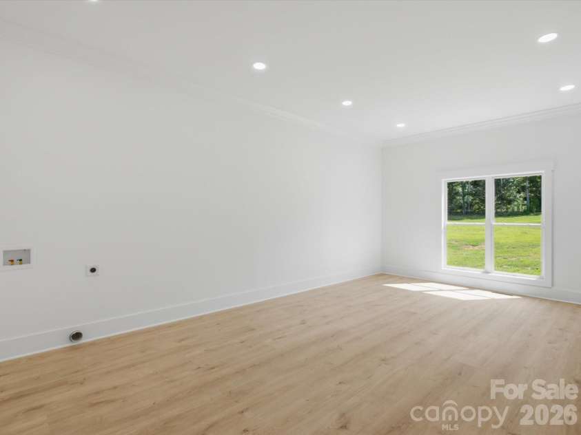8018 Fairmont Drive, Waxhaw, NC 28173.  MLS# CAR4276331, YatesRealty ID 5633. Primary closet with second laundry connections