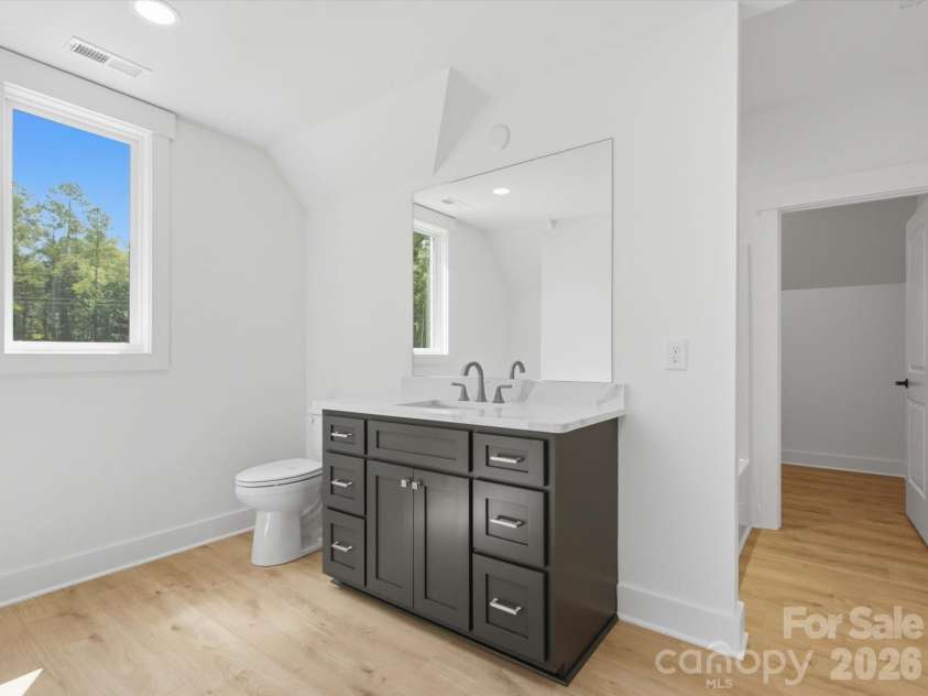 8018 Fairmont Drive, Waxhaw, NC 28173.  MLS# CAR4276331, YatesRealty ID 5633. Upper level bedroom bath suite