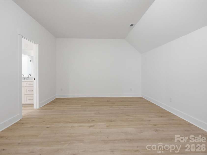 8018 Fairmont Drive, Waxhaw, NC 28173.  MLS# CAR4276331, YatesRealty ID 5633. Upper level flex/bed