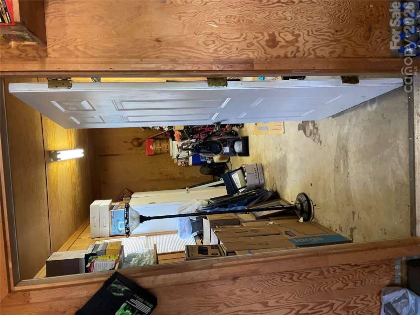 3512 Goodson Road, Maiden, NC 28650.  MLS# CAR4434010, YatesRealty ID 56331. Storage space off the garage