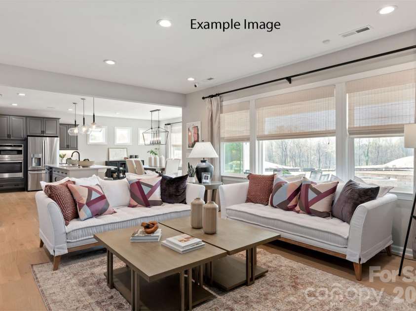 2149 Camber Drive, Gastonia, NC 28054.  MLS# CAR4430191, YatesRealty ID 56341. Example Photo - Family Room/Kitchen/Breakfast