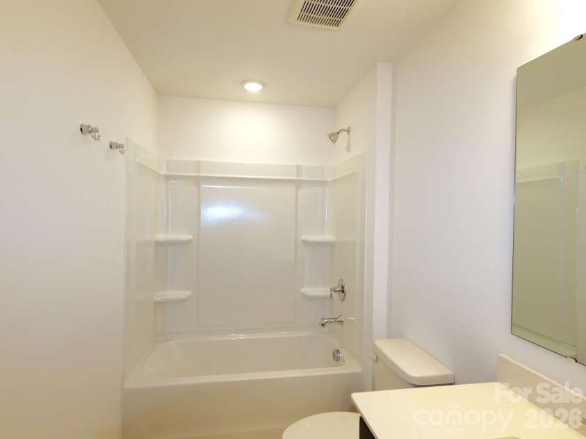 2705 Yeager Drive, Concord, NC 28027.  MLS# CAR4434135, YatesRealty ID 56344. Secondary bathroom