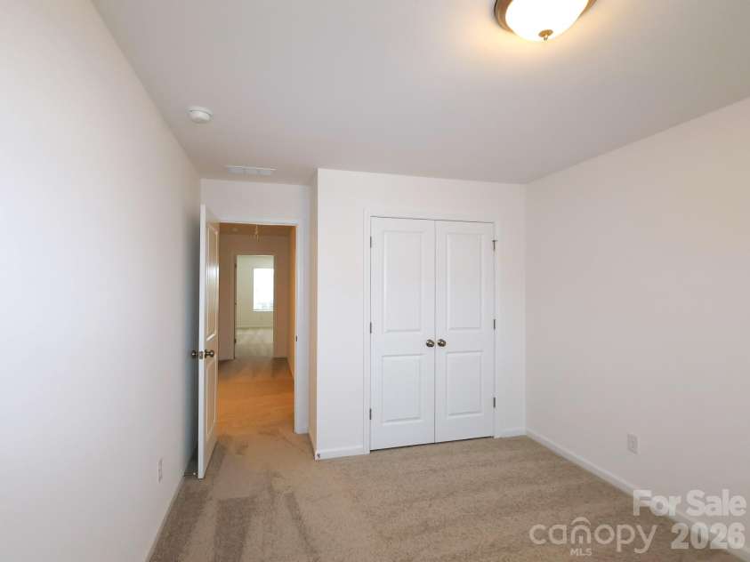 2705 Yeager Drive, Concord, NC 28027.  MLS# CAR4434135, YatesRealty ID 56344. Secondary bedroom