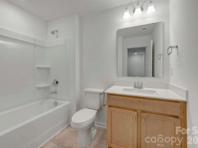 783 Kitfox Drive, Concord, NC 28027.  MLS# CAR4434139, YatesRealty ID 56346. Secondary bathroom