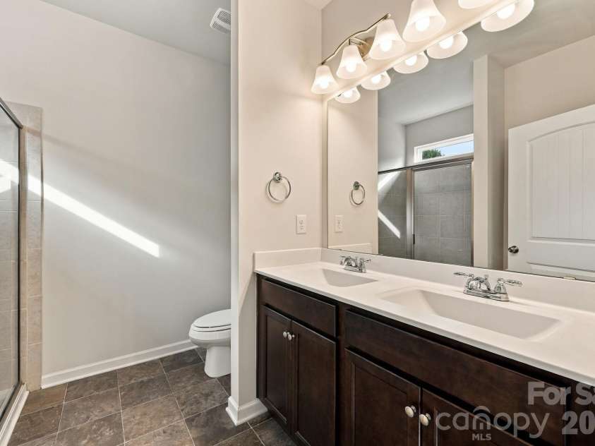 1507 Troon Drive, Salisbury, NC 28144.  MLS# CAR4434208, YatesRealty ID 56358. Primary bathroom
