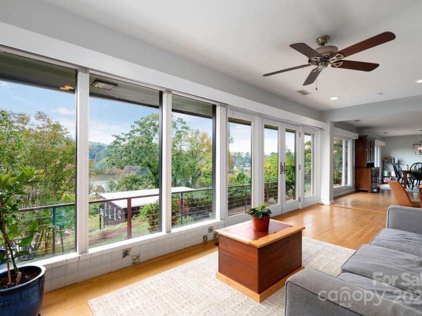 8 Kensington Road, Asheville, NC 28804.  MLS# CAR4305801, YatesRealty ID 5637. Windows Line the Back of Home