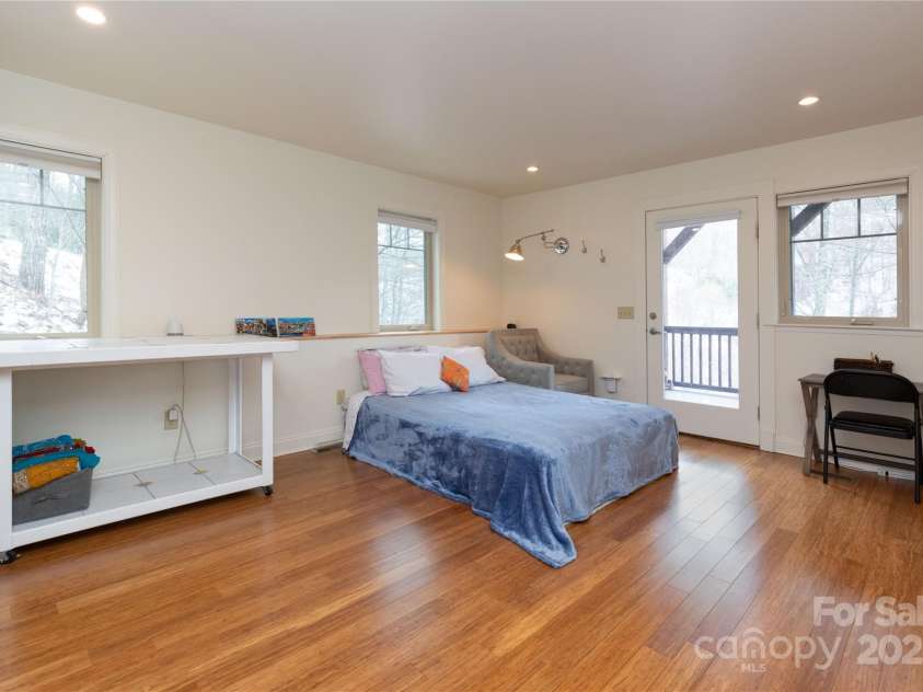 20 Lila Lane, Clyde, NC 28721.  MLS# CAR4231979, YatesRealty ID 5639. Downstairs Bedroom