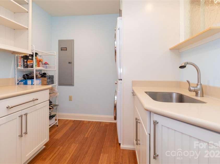 20 Lila Lane, Clyde, NC 28721.  MLS# CAR4231979, YatesRealty ID 5639. Downstairs Laundry Room