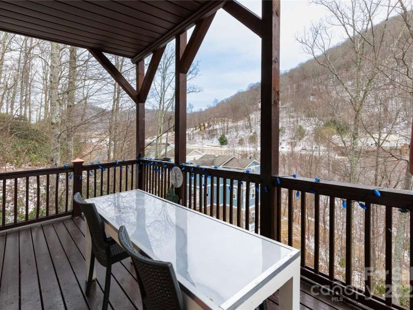20 Lila Lane, Clyde, NC 28721.  MLS# CAR4231979, YatesRealty ID 5639. Main Level Covered Deck