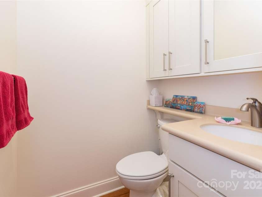 20 Lila Lane, Clyde, NC 28721.  MLS# CAR4231979, YatesRealty ID 5639. Main Level Half Bath