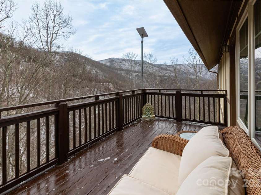 20 Lila Lane, Clyde, NC 28721.  MLS# CAR4231979, YatesRealty ID 5639. Upstairs Deck