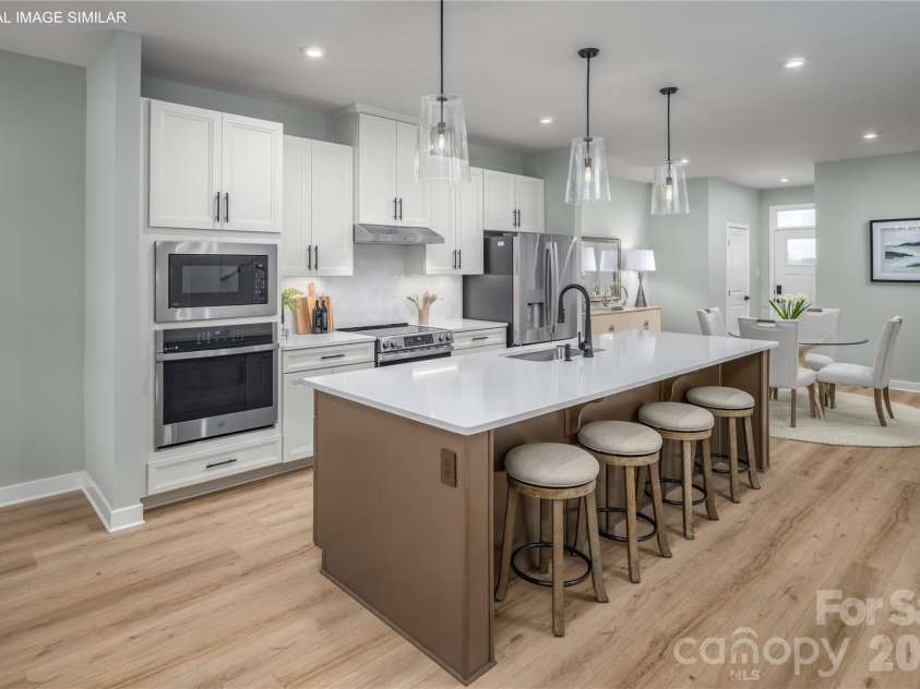 11138 Emerson Landing Drive, Charlotte, NC 28214.  MLS# CAR4390947, YatesRealty ID 56390. Bright, open kitchen with generous prep space and a large center island.