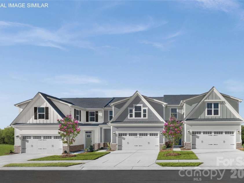 2255 Island Lake Drive, Charlotte, NC 28214.  MLS# CAR4366965, YatesRealty ID 56391. Caroline plan with true main-level living—first-floor primary suite and laundry for everyday ease.