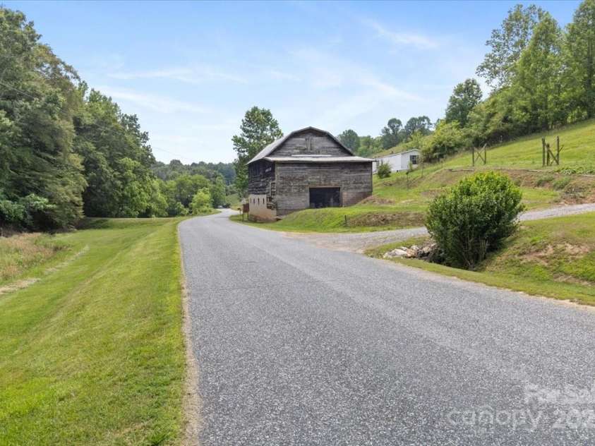 461 Tweed Road, Madison, NC 28753.  MLS# CAR4267871, YatesRealty ID 564. Barn included just before the driveay