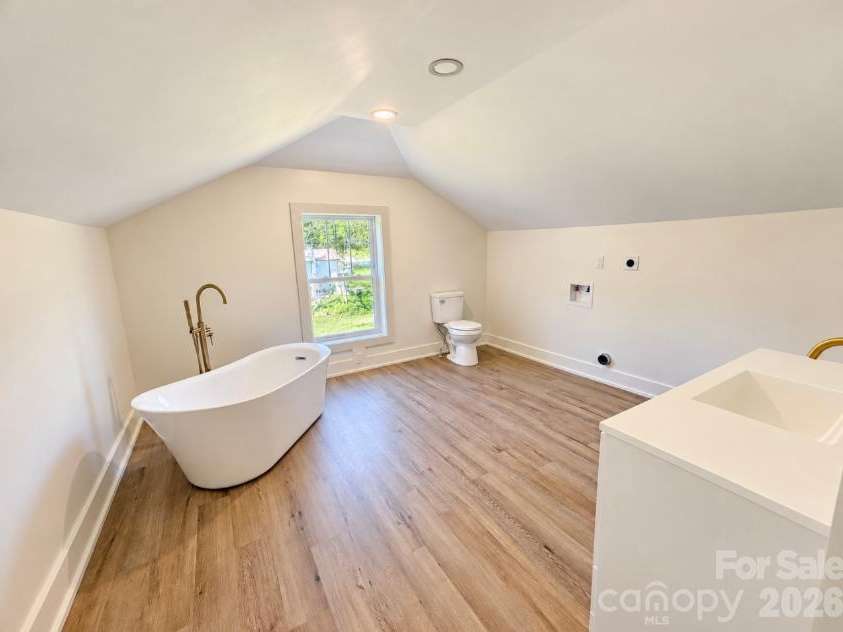 3786 US 70 Highway, Marion, NC 28752.  MLS# CAR4411713, YatesRealty ID 56412. Upper Bath...Laundry