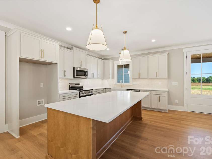 1218 Mills Harris Road, Wingate, NC 28174.  MLS# CAR4432605, YatesRealty ID 56468. Kitchen