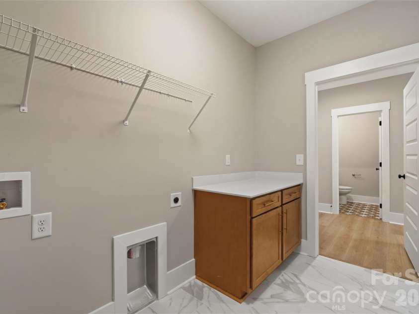 1218 Mills Harris Road, Wingate, NC 28174.  MLS# CAR4432605, YatesRealty ID 56468. Laundry room