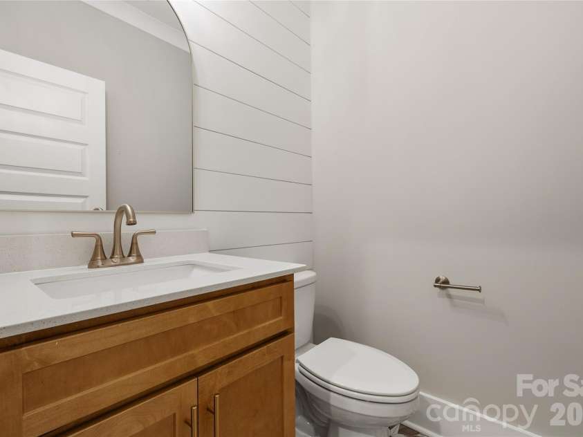 1218 Mills Harris Road, Wingate, NC 28174.  MLS# CAR4432605, YatesRealty ID 56468. Powder Bath