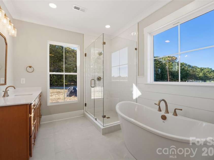 1218 Mills Harris Road, Wingate, NC 28174.  MLS# CAR4432605, YatesRealty ID 56468. Primary Bath