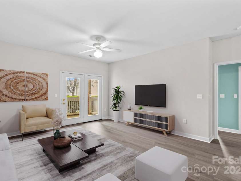 19725 Deer Valley Drive, Cornelius, NC 28031.  MLS# CAR4243180, YatesRealty ID 5648. Open Living Room  VIRTUALLY STAGED