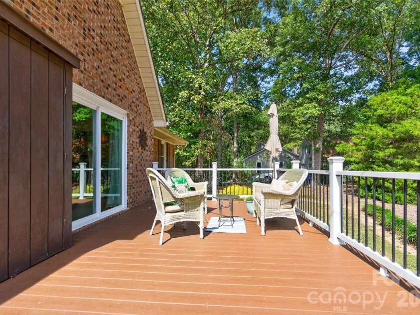 2209 Rainbrook Drive, Monroe, NC 28112.  MLS# CAR4432727, YatesRealty ID 56489. Expanded deck with trex